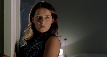 Movie still from “The One and Only” (1999), directed by Susanne Bier – A beautiful young lady wearing a black dress; Close Up shot, Low angle