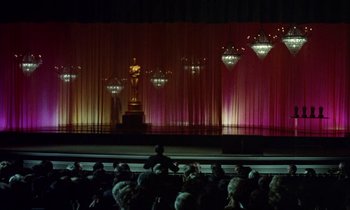 Movie still from “The Oscar” (1966), directed by Russell Rouse – A crowd of people sitting in front of a stage; Extreme Wide shot, Low angle