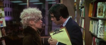 Movie still from “The Owl and the Pussycat” (1970), directed by Herbert Ross – A man and a woman looking at each other; Medium shot, Over the shoulder angle