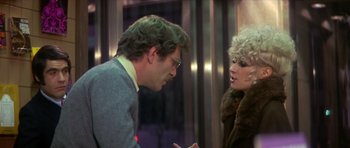 Movie still from “The Owl and the Pussycat” (1970), directed by Herbert Ross – A man and a woman talking to each other; Medium shot, Over the shoulder angle