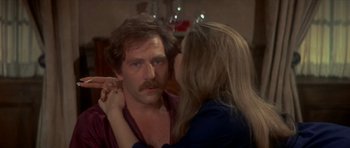 Movie still from “The Owl and the Pussycat” (1970), directed by Herbert Ross – A man and a woman looking into each others eyes; Close Up shot, Over the shoulder angle