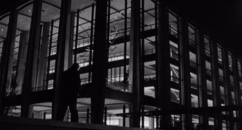 Movie still from “The Pawnbroker” (1964), directed by Sidney Lumet – A man is walking in a large building; Extreme Wide shot, Low angle