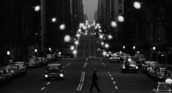 Movie still from “The Pawnbroker” (1964), directed by Sidney Lumet – A black and white photo of a city street; Extreme Wide shot, High angle