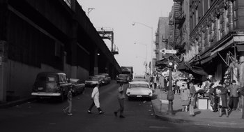 Movie still from “The Pawnbroker” (1964), directed by Sidney Lumet – A black and white photo of people crossing the street; Extreme Wide shot, High angle