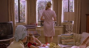 Movie still from “The Perfect Man” (2005), directed by Mark Rosman – A woman and a little girl in front of a window; Medium shot, Over the shoulder angle