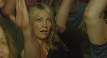 Movie still from “The Perfect Man” (2005), directed by Mark Rosman – A person watching something; Close Up shot, Over the shoulder angle