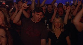 Movie still from “The Perfect Man” (2005), directed by Mark Rosman – A group of people standing in front of each other; Medium shot, Low angle