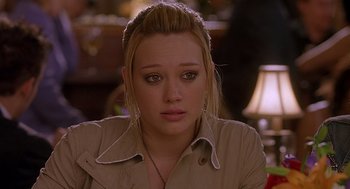 Movie still from “The Perfect Man” (2005), directed by Mark Rosman – A person wearing a jacket; Close Up shot, Over the shoulder angle