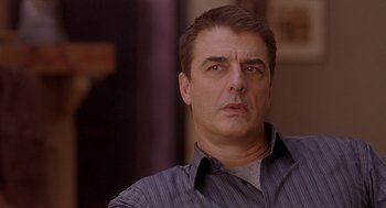 Movie still from “The Perfect Man” (2005), directed by Mark Rosman – A person wearing a shirt; Close Up shot, Over the shoulder angle