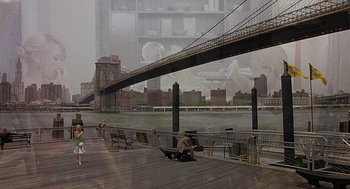 Movie still from “The Perfect Man” (2005), directed by Mark Rosman – People are sitting on a bench on a pier; Extreme Wide shot, Over the shoulder angle