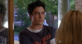 Movie still from “The Perfect Man” (2005), directed by Mark Rosman – A young man is looking at a woman; Close Up shot, Over the shoulder angle