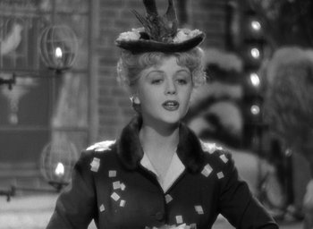 Movie still from “The Picture of Dorian Gray” (1945), directed by Albert Lewin – A black and white photo of a woman wearing a hat; Close Up shot, Low angle