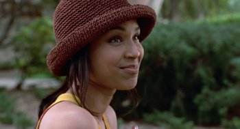 Movie still from “The Players Club” (1998), directed by Ice Cube – A person wearing a hat; Close Up shot, High angle