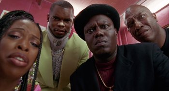 Movie still from “The Players Club” (1998), directed by Ice Cube – A group of men standing next to each other; Close Up shot, Low angle