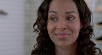 Movie still from “The Players Club” (1998), directed by Ice Cube – A woman's eyes and face; Close Up shot, Over the shoulder angle