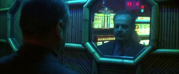 Movie still from “The Pledge” (2001), directed by Sean Penn – A man looking at himself in the mirror; Close Up shot, Over the shoulder angle