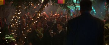 Movie still from “The Pledge” (2001), directed by Sean Penn – A group of people standing in front of a tree; Medium shot, Over the shoulder angle