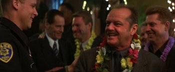 Movie still from “The Pledge” (2001), directed by Sean Penn – A group of men sitting around a room together; Close Up shot, Over the shoulder angle