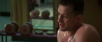 Movie still from “The Pledge” (2001), directed by Sean Penn – A person in a room; Close Up shot, Over the shoulder angle