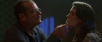 Movie still from “The Pledge” (2001), directed by Sean Penn – An older man and a younger man are looking at each other; Close Up shot, Over the shoulder angle