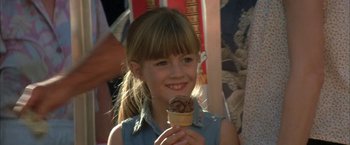 Movie still from “The Pledge” (2001), directed by Sean Penn – A young girl holding an ice cream cone; Close Up shot, High angle