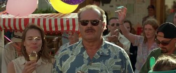 Movie still from “The Pledge” (2001), directed by Sean Penn – A man in a blue hawaiian shirt and sunglasses; Close Up shot, Low angle