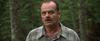 Movie still from “The Pledge” (2001), directed by Sean Penn – An older man with a beard and mustache; Close Up shot, Low angle