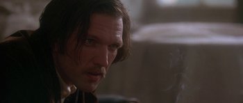 Movie still from “The Portrait of a Lady” (1996), directed by Jane Campion – A person with long hair; Close Up shot, Over the shoulder angle