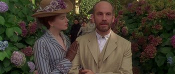 Movie still from “The Portrait of a Lady” (1996), directed by Jane Campion – A man and a woman dressed in old fashioned clothing; Medium shot, Over the shoulder angle