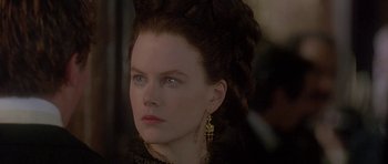 Movie still from “The Portrait of a Lady” (1996), directed by Jane Campion – A person wearing a dress; Close Up shot, Over the shoulder angle