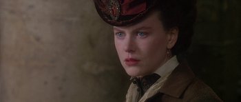 Movie still from “The Portrait of a Lady” (1996), directed by Jane Campion – A person wearing a hat; Close Up shot, Over the shoulder angle