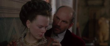 Movie still from “The Portrait of a Lady” (1996), directed by Jane Campion – A man and a woman looking at one another; Close Up shot, Over the shoulder angle