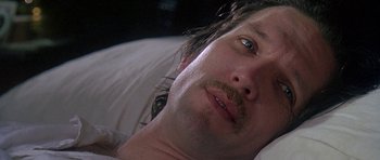 Movie still from “The Portrait of a Lady” (1996), directed by Jane Campion – A person laying in a bed; Close Up shot, Overhead angle