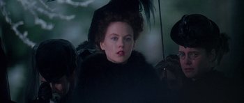 Movie still from “The Portrait of a Lady” (1996), directed by Jane Campion – A person wearing a hat; Close Up shot, Over the shoulder angle