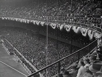 Movie still from “The Pride of the Yankees” (1942), directed by Sam Wood – A crowd of people in a stadium watching a baseball game; Extreme Wide shot, High angle