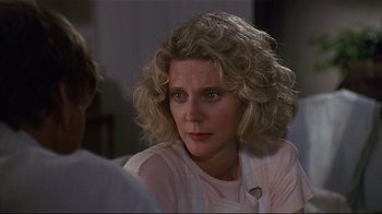 Movie still from “The Prince of Tides” (1991), directed by Barbra Streisand – A person wearing a pink shirt; Close Up shot, Over the shoulder angle