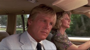 Movie still from “The Prince of Tides” (1991), directed by Barbra Streisand – A man and a woman sitting in the back of a car; Close Up shot, Low angle