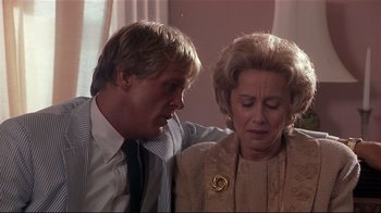 Movie still from “The Prince of Tides” (1991), directed by Barbra Streisand – An older woman and a younger man looking at each other; Close Up shot, Over the shoulder angle