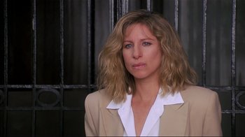 Movie still from “The Prince of Tides” (1991), directed by Barbra Streisand – A person wearing a suit and tie; Close Up shot, Over the shoulder angle