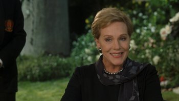 Movie still from “The Princess Diaries” (2001), directed by Garry Marshall – A person wearing a black shirt; Close Up shot, Over the shoulder angle