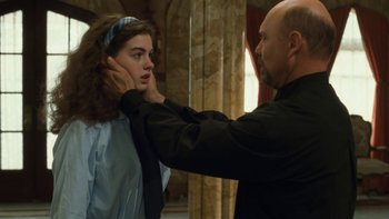 Movie still from “The Princess Diaries” (2001), directed by Garry Marshall – A man putting a tie on a young girl's neck; Close Up shot, Over the shoulder angle