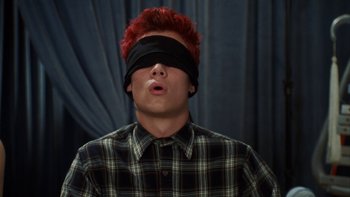 Movie still from “The Princess Diaries” (2001), directed by Garry Marshall – A man with a blindfold on his head; Medium shot, High angle