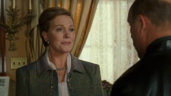 Movie still from “The Princess Diaries” (2001), directed by Garry Marshall – A woman in a green jacket looking at a man in a black jacket; Close Up shot, Over the shoulder angle