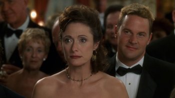 Movie still from “The Princess Diaries” (2001), directed by Garry Marshall – A person wearing a necklace; Close Up shot, Over the shoulder angle
