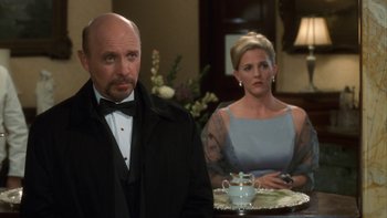 Movie still from “The Princess Diaries” (2001), directed by Garry Marshall – A man and a woman sitting at a dinner table; Medium shot, Over the shoulder angle