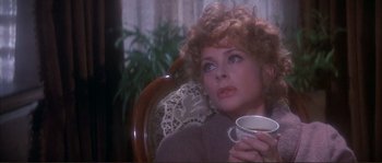 Movie still from “The Private Life of Sherlock Holmes” (1970), directed by Billy Wilder – A person holding a coffee cup; Close Up shot, High angle