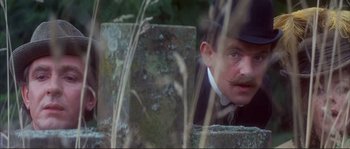 Movie still from “The Private Life of Sherlock Holmes” (1970), directed by Billy Wilder – A person wearing a hat and a mustache; Close Up shot, Low angle