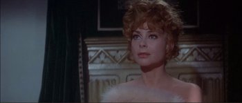 Movie still from “The Private Life of Sherlock Holmes” (1970), directed by Billy Wilder – A person wearing a dress; Close Up shot, Over the shoulder angle