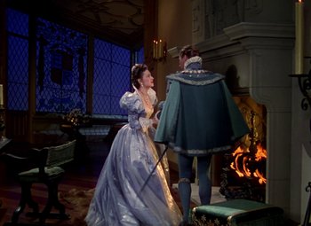 Movie still from “The Private Lives of Elizabeth and Essex” (1939), directed by Michael Curtiz – A man and a woman dressed in medieval clothing; Wide shot, High angle