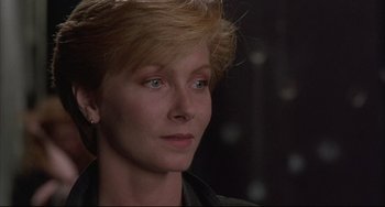 Movie still from “The Punisher” (1989), directed by Mark Goldblatt – A person with short blonde hair; Close Up shot, Low angle